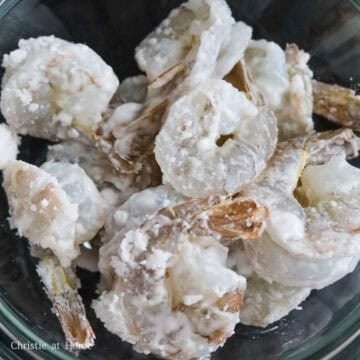 Add cornstarch and toss to evenly coat the shrimp. If needed, add more cornstarch. Residual starch in the bowl is normal.