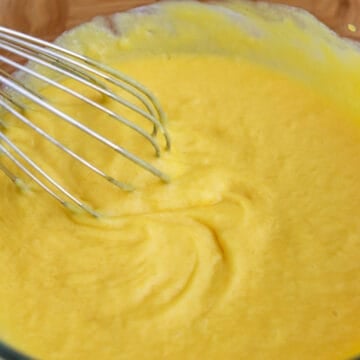 Sugar, coconut milk, and mango purée whisked into the bloomed gelatin.