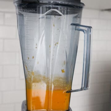 Ripe mangos peeled, pitted, and blended into a smooth mango purée.