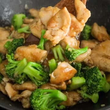 Chicken and broccoli coated in a glossy savory sauce.