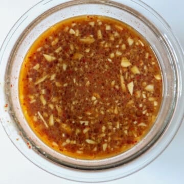 Smooth, unsimmered dark brown stir-fry sauce mixture with all liquid ingredients combined.
