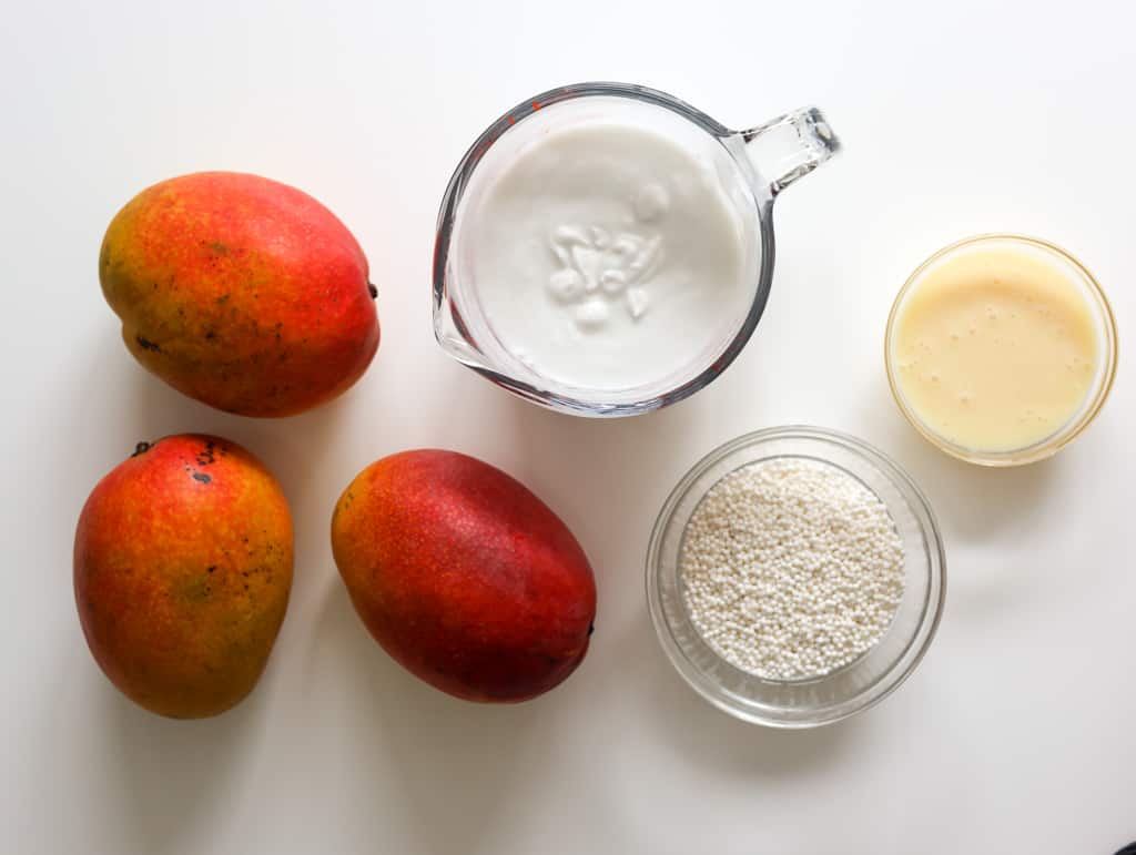 Fresh mangos, coconut milk, sweetened condensed milk, and small tapioca pearls for mango sago.