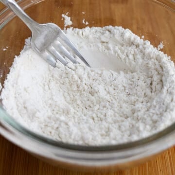 Flour mixture, beaten egg, and panko breadcrumbs in shallow plates