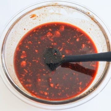 In a bowl, mix together Marinade ingredients. Use a fork to mash the red fermented bean curd cubes into a paste. Set aside.