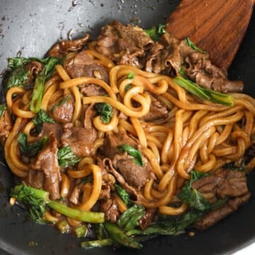 Toss in the beef and stir fry for another minute until beef is cooked through. Serve and enjoy!