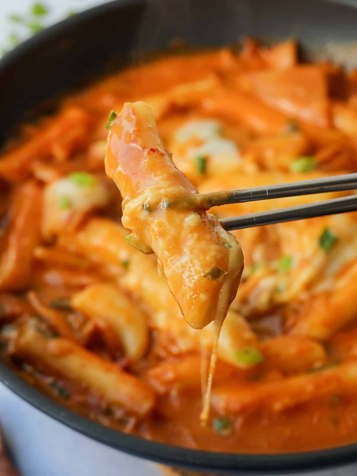 a bite shot of creamy Rosé Tteokbokki