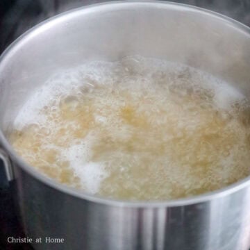 First bring a large pot filled with water to boil on medium-high heat and season with salt. Then add spaghetti pasta and boil until al dente to package directions, about 8-9 minutes. Next reserve 3 tablespoon or 45 ml hot pasta water.