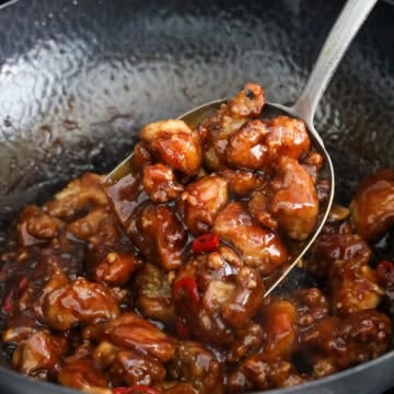 Crispy chicken coated in thick Mongolian sauce with red chilies and green onions.
