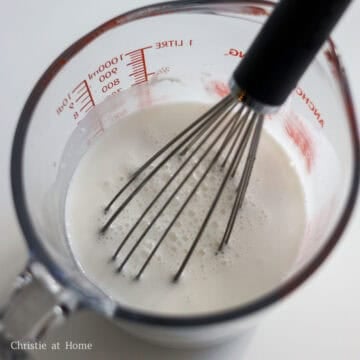 To make the batter: In a large bowl or a large measuring cup with a lip, whisk together rice flour, glutinous rice flour and salt until well combined. Pour cold water into the dry ingredients and whisk well. Set aside.