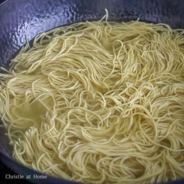 In a large bowl or large pan, soak chow mein noodles in hot boiling water for 10-15 seconds or JUST until loosened. Strain the noodles.