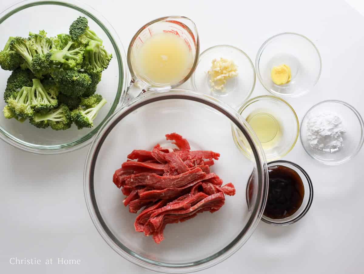 Sliced flank steak, broccoli, ginger, garlic, water, vegetable oil, oyster sauce, cornstarch, and chicken stock to make Chinese beef and broccoli.