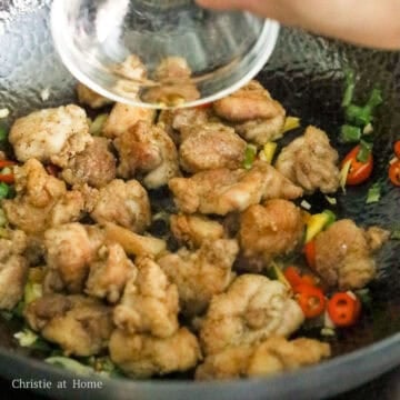 Crispy chicken tossed with red chilis and green onions.