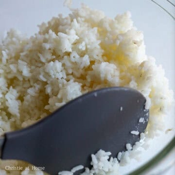 Season hot cooked short-grain rice with 1 teaspoon salt. Allow this to cool down but keep it covered to prevent the rice from drying out. Set aside.