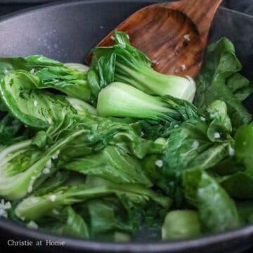 Baby bok choy steaming with garlic