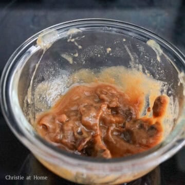 To make your tamarind concentrate: submerge tamarind pulp in ⅓ cup hot boiling water. Allow for it to cool and then with your hands, squeeze and massage the pulp as best you can, until it dissolves in the water.