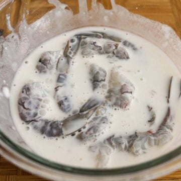 Mix shrimp into the batter ensuring it's fully coated.Â