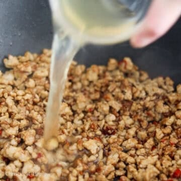 Browned ground meat stir-fried with sauce and chicken stock until mostly absorbed.