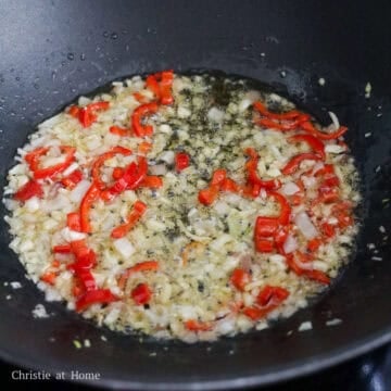Shallot, garlic, and red chilies stir-fried until fragrant and slightly softened.