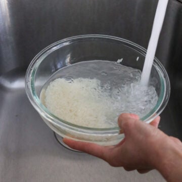Jasmine rice rinsed with cold water until the water runs clear.