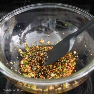 Soy sauce, toasted sesame oil, garlic, sesame seeds, and green onions mixed into a dressing.