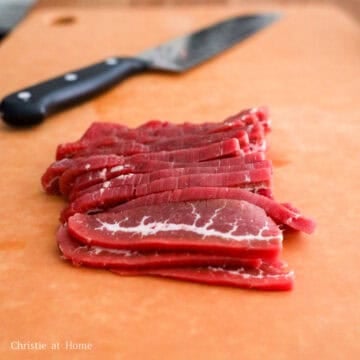 Flank steak sliced thinly against the grain.