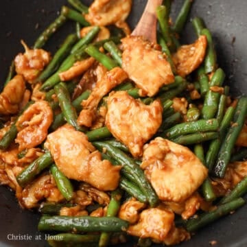 Then toss in the cooked chicken until coated in sauce, about 10 seconds. Remove off heat. Serve and enjoy!